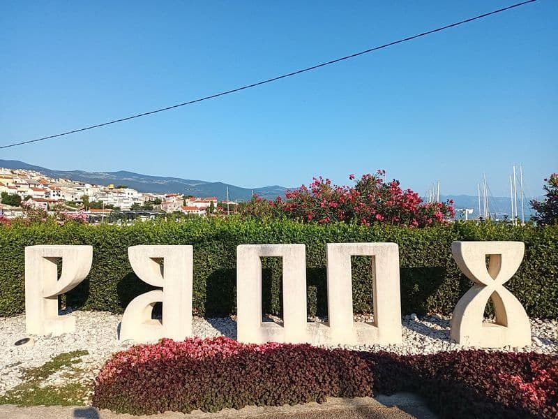 Glagolitic script sculpture at the entrance to Novi Vinodolski, Croatia